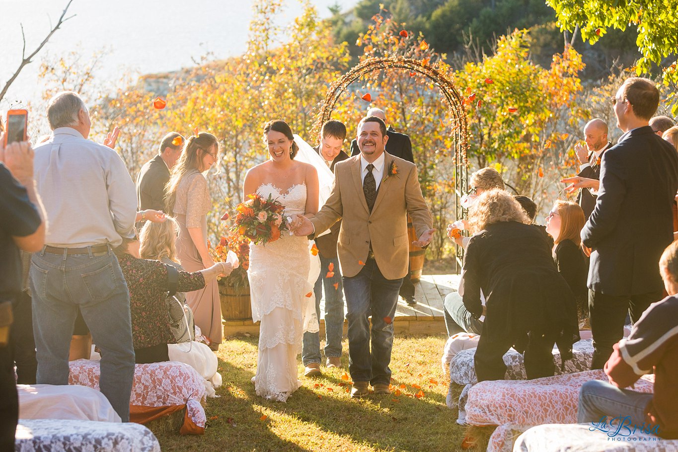happy bride groom backyard intimate wedding recessional