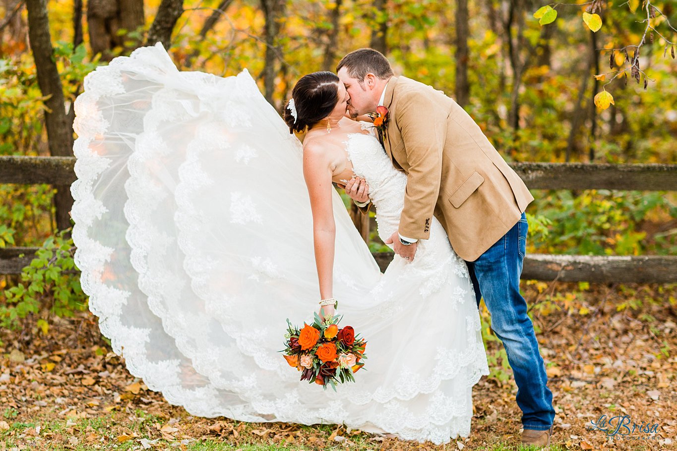 bride groom kissing wedding dress train toss