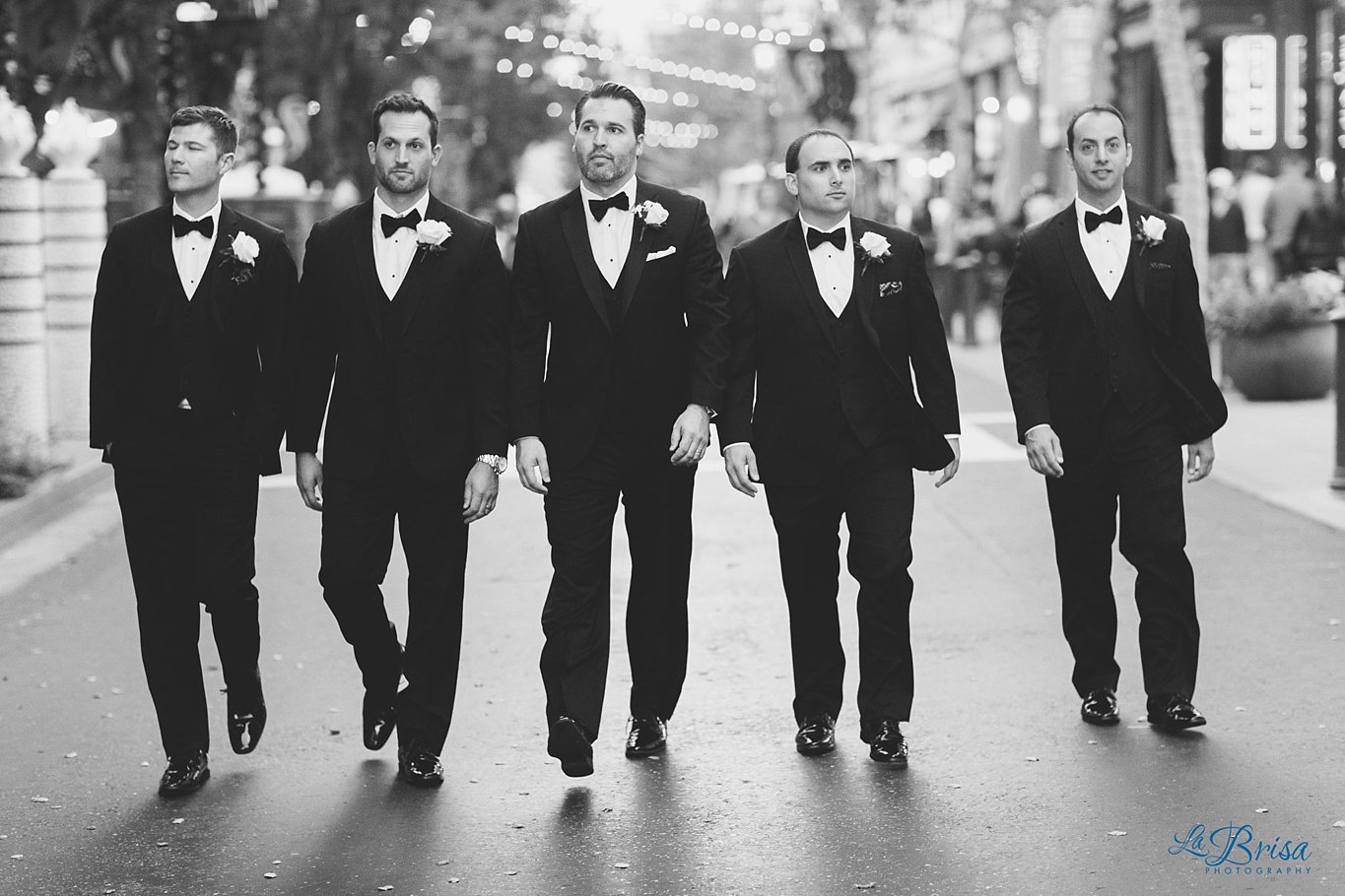 groomsmen walking through santana row streets