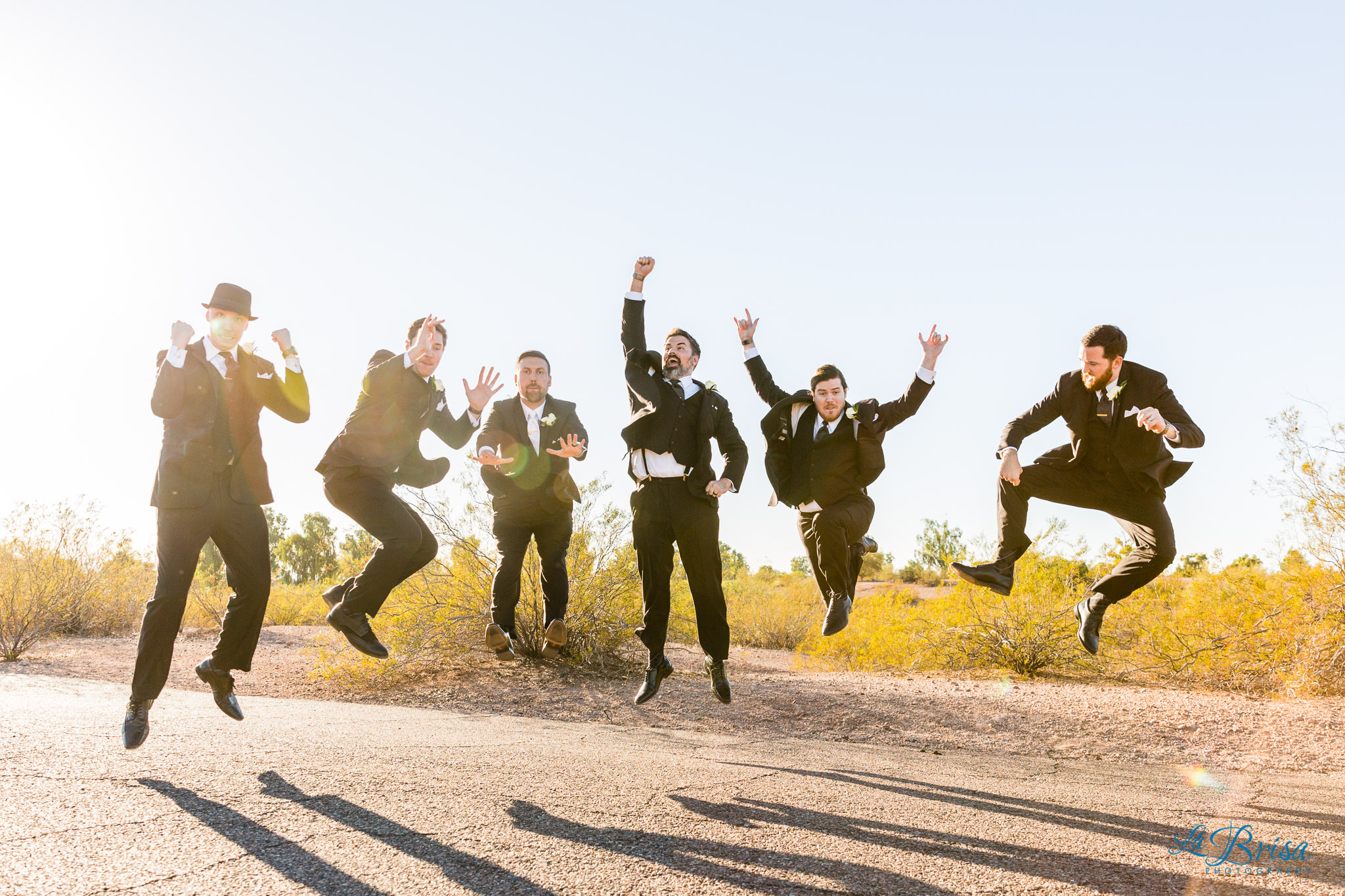 Papago Park Wedding Groomsmen Jumping