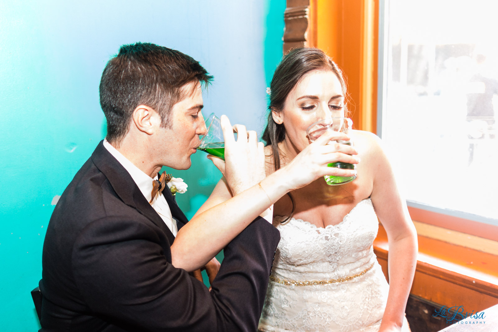 bride groom drinking green beers