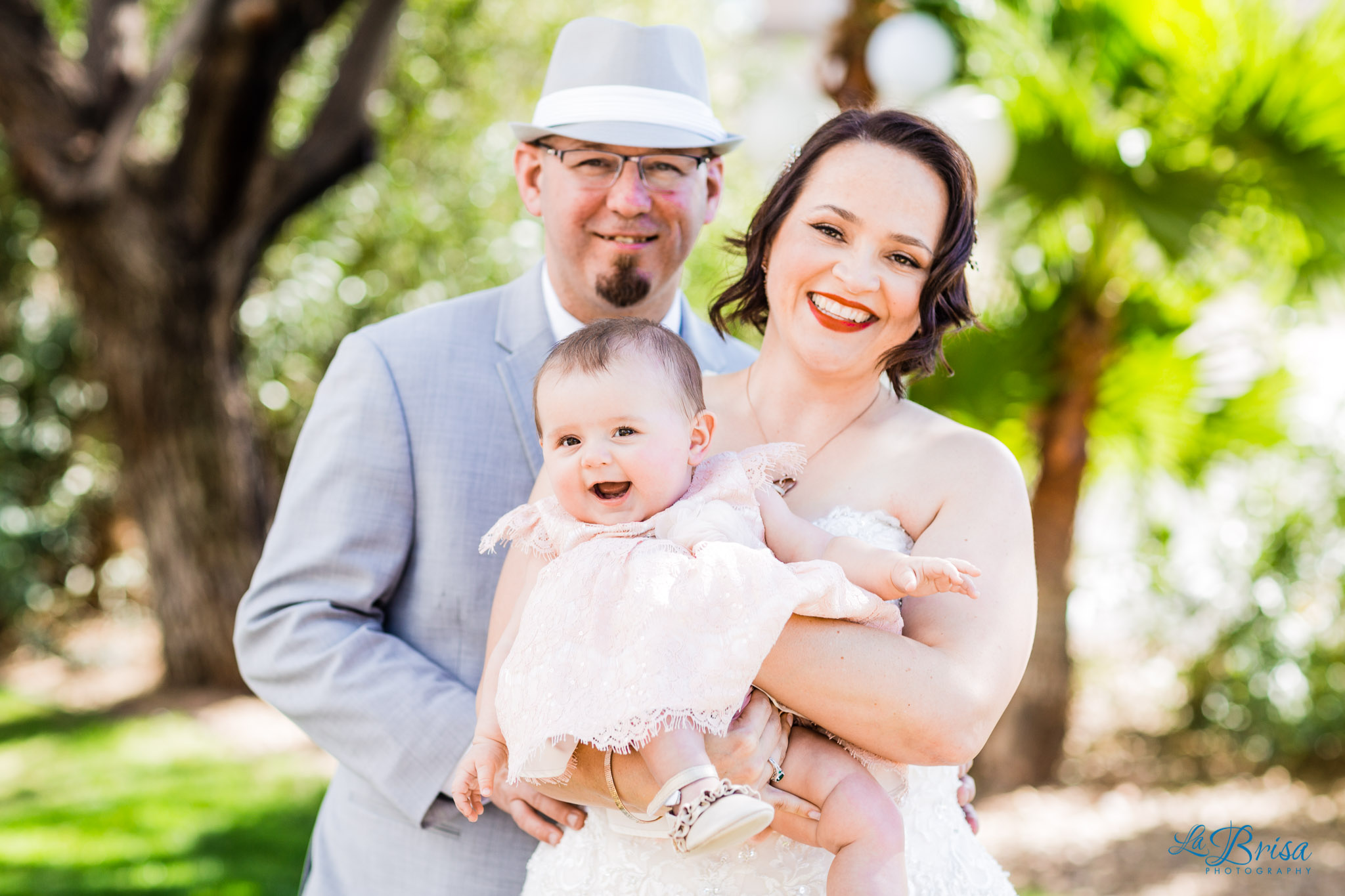 bride groom daughter family photo buttes at reflections wedding