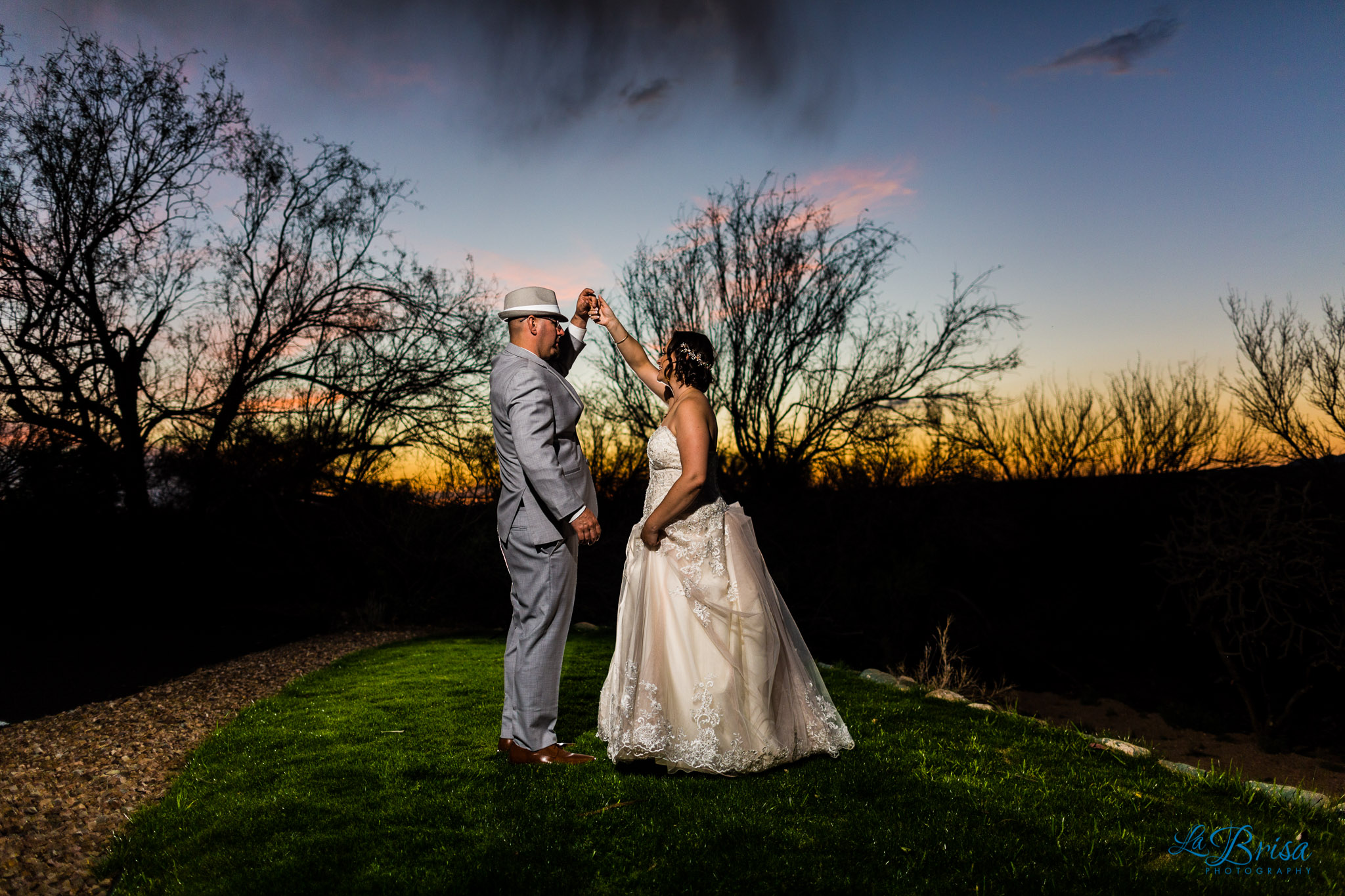 bride groom twirling sunset