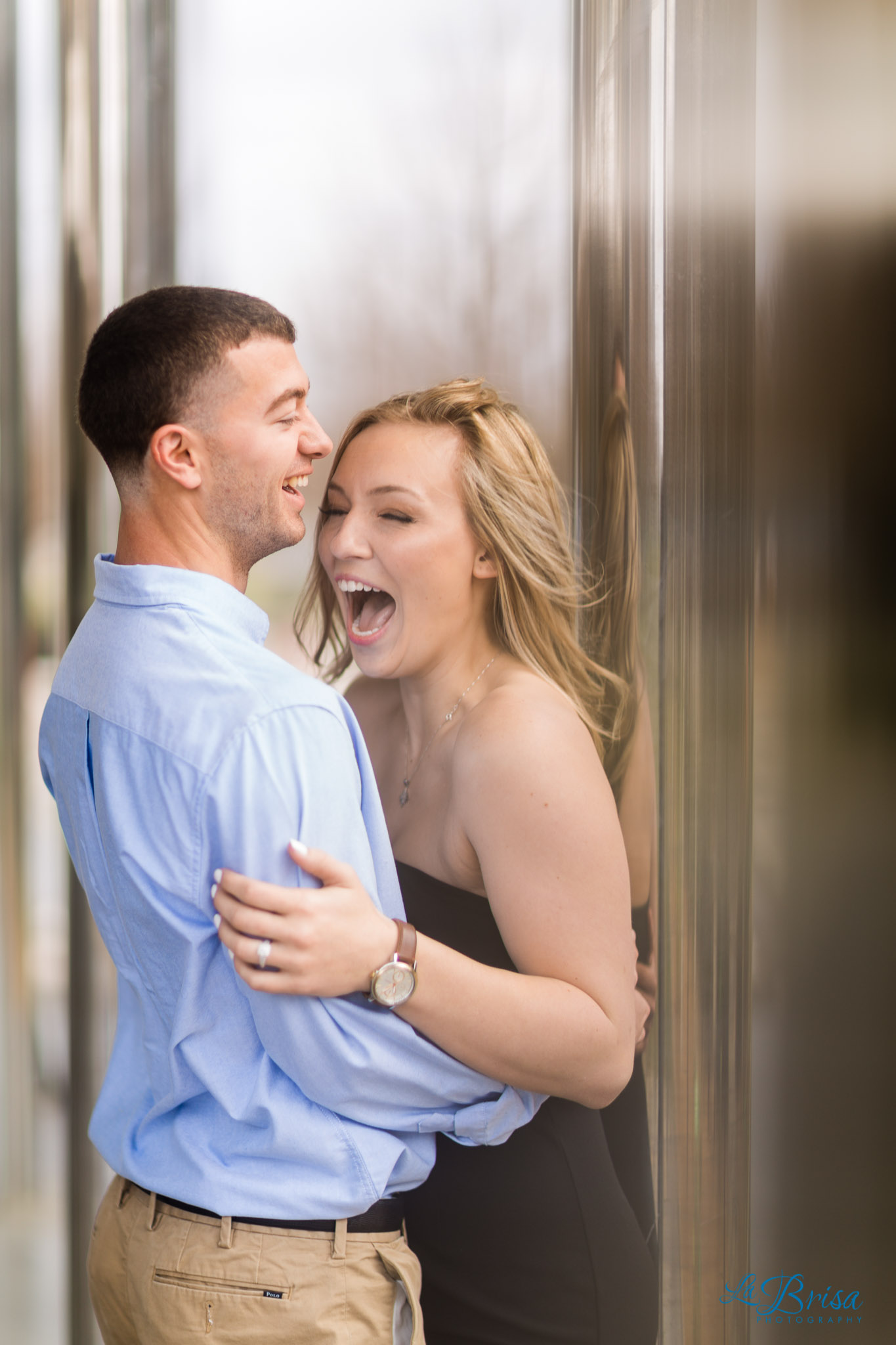 couple laughing dallas engagement 