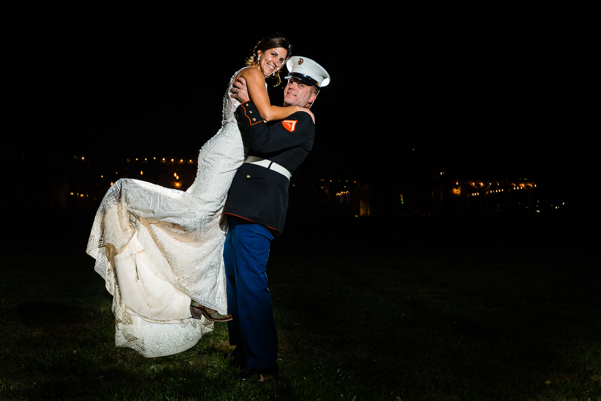 Marine lifting bride overhead military wedding