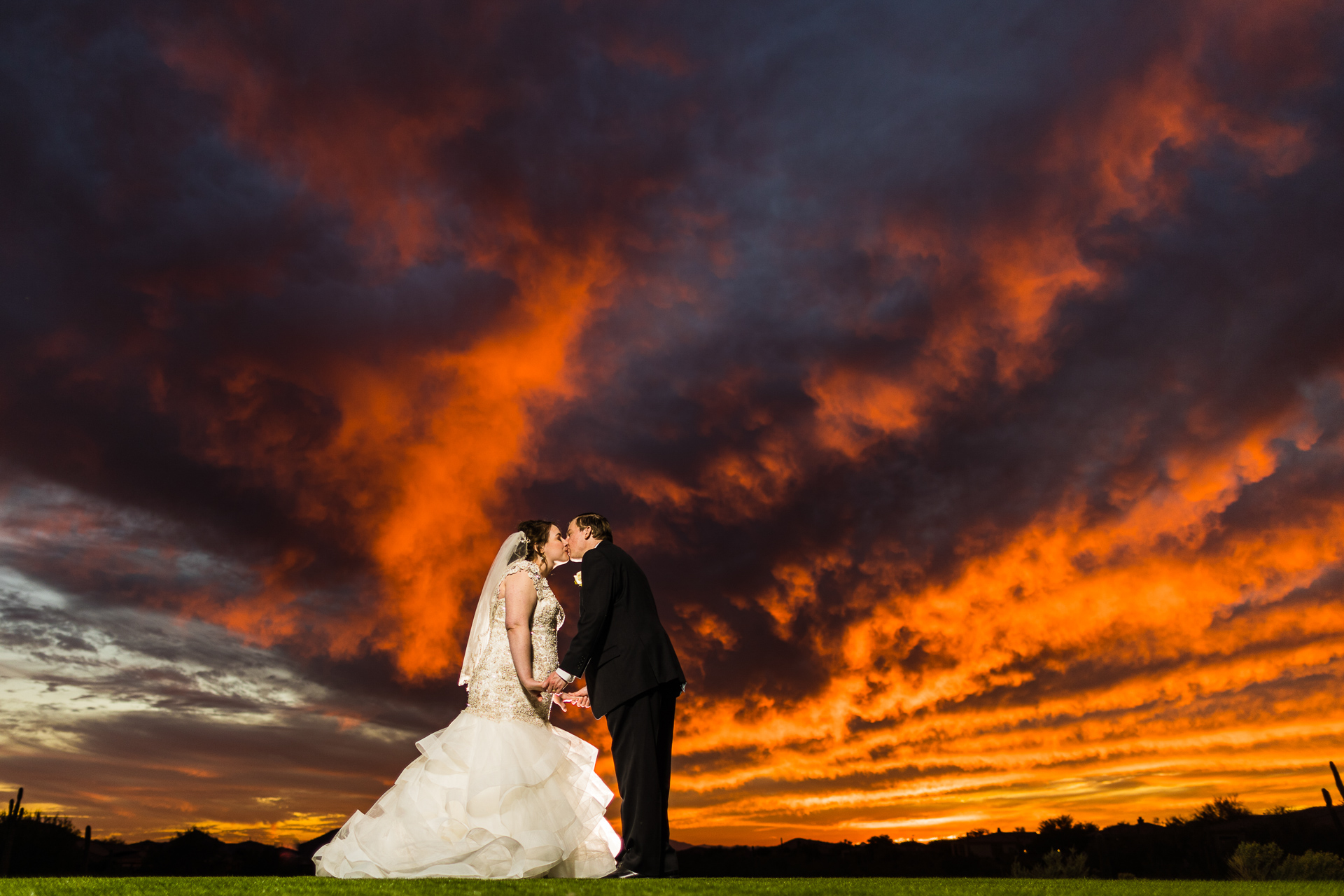 Bride Groom kissing sunset scottsdale arizona