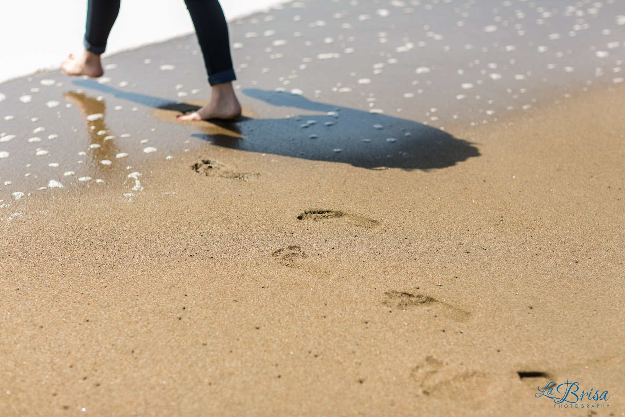 Footprints into ocean at Baker Beach La Brisa Photography Chris Hsieh