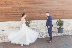 bride twirls for groom during first look stonecrest